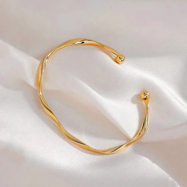 Golden Twisted Cuff Bracelet - Image 1
